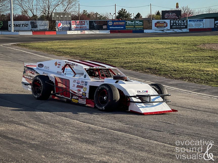 Recording the sound of a Speed Tour Modified race car at Meridian Speedway in Meridian, Idaho on Thursday, April 1, 2021. Photo by Richard Alan Hannon