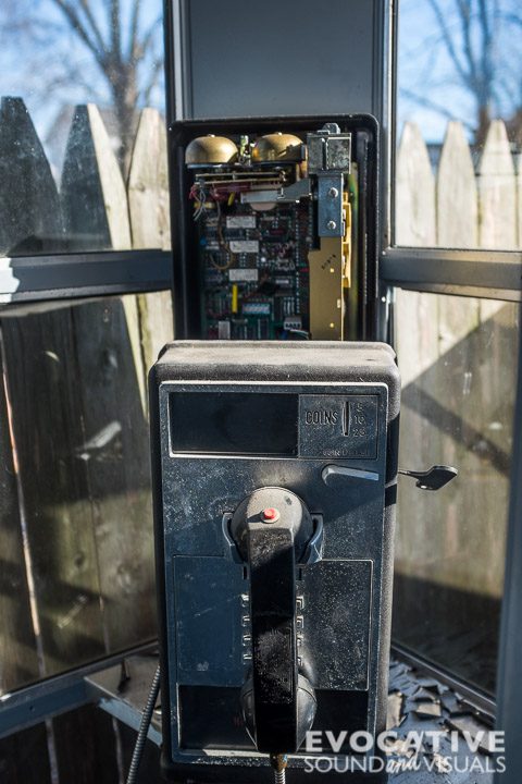 Capturing the sound of two discarded mid 20th century US telephone booths with a pair of Barcus Berry contact microphones in Galion, Ohio on February 21, 2017. Photo by Richard Alan Hannon